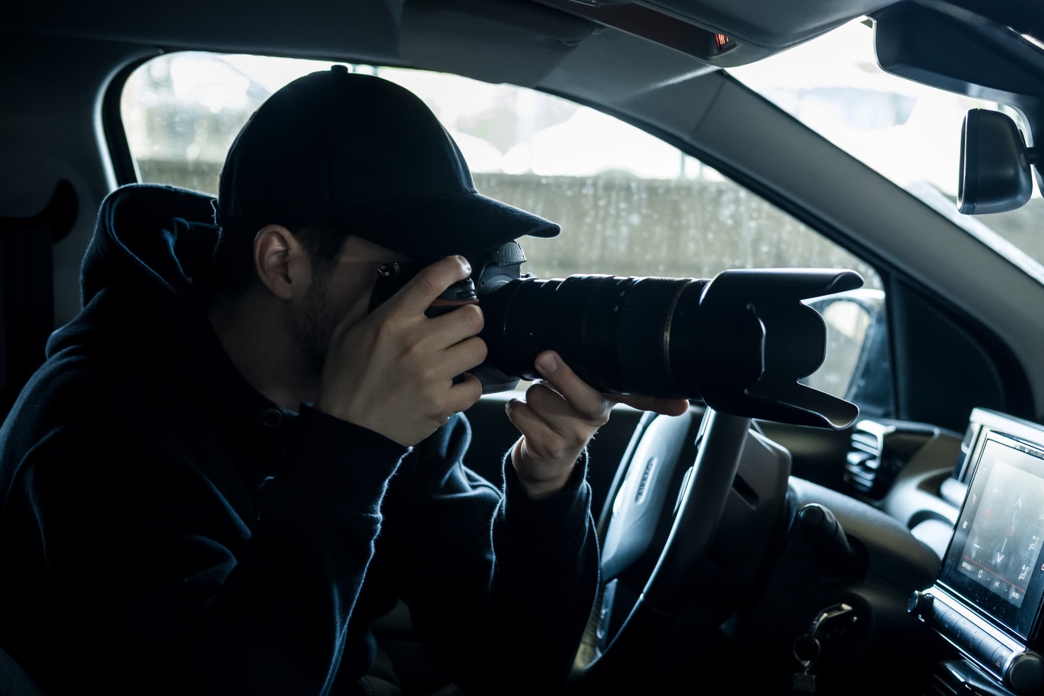 Man taking a discreet photo